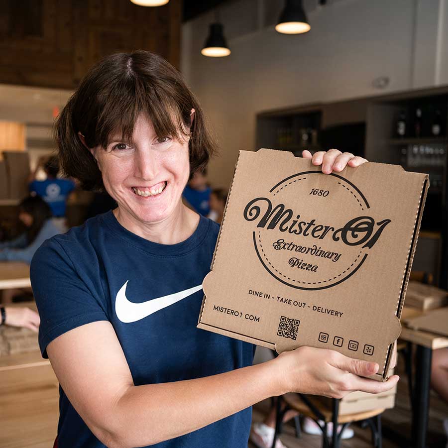 Trailblazer Academy STAR participant showing off MisterO1 pizza box | STARability Foundation